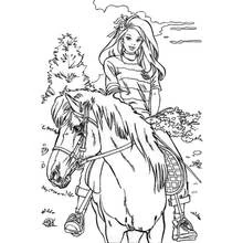 Coloriage Poney monté par une jeune cavalière