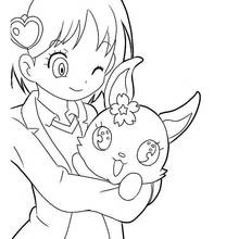 Coloriage Jewelpet Tinkle porté par une petite fille