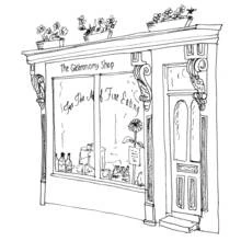 Coloriage Magasin de gastronomie avec jardinières fleuries