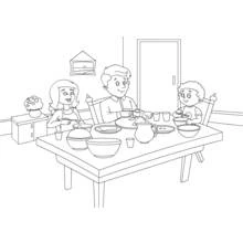 Coloriage Famille à table dans la salle à manger