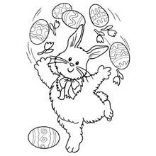 Coloriage Jongleur lapin jonglant avec des œufs de Pâques