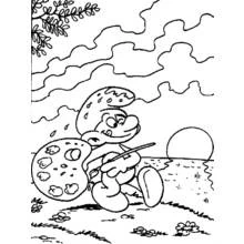 Coloriage Peintre schtroumpf tenant une palette et un pinceau