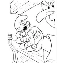 Coloriage Schtroumpf pris dans la main de Gargamel Coloriage Schtroumpf pris dans la main de Gargamel