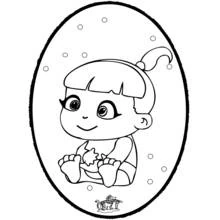 Coloriage Bébé assis dans un cadre ovale