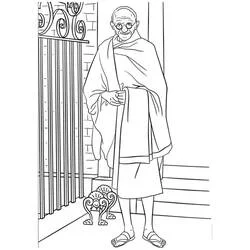 Coloriage Mahatma Gandhi debout devant un portail en fer