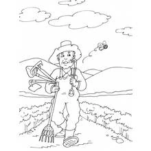 Coloriage Jardinier portant ses outils