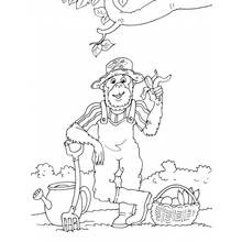 Coloriage Jardinier singe tenant des légumes