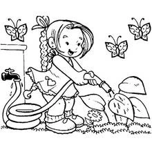 Coloriage Petite fille arrosant les plantes du jardin