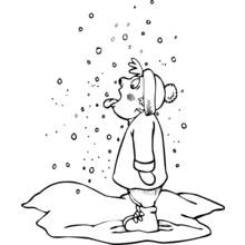 Coloriage Ours attrapant des flocons de neige avec sa langue