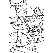 Coloriage Garçon creusant dans le sable à la plage