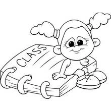 Coloriage Fillette allongée sur un cahier de classe