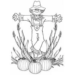 Coloriage Épouvantail entouré de citrouilles et de blé