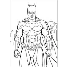 Coloriage Batman debout devant les gratte-ciels de la ville