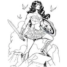 Coloriage Wonder Woman debout sur des rochers avec épée et bouclier