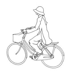 Coloriage Femme à vélo avec un panier