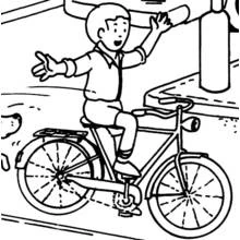 Coloriage Garçon à vélo sans les mains