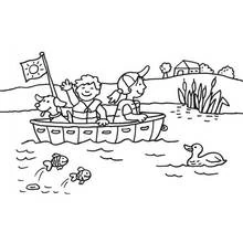Coloriage Enfants naviguant en canot avec leur chien